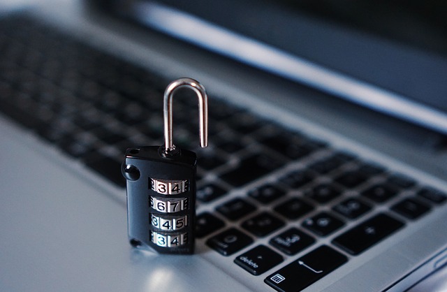 combination lock balanced on a computer keyboard