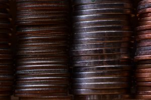 round gold-colored coin lot pile